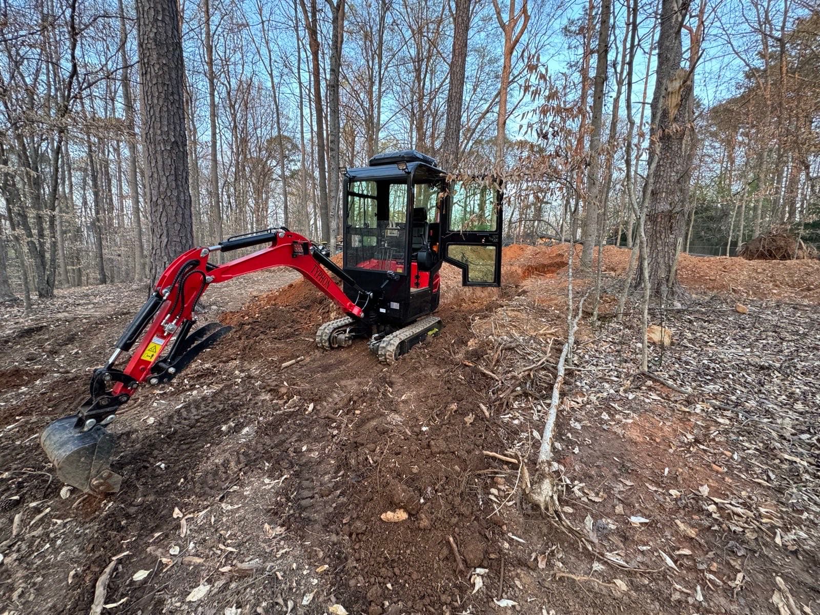 Pole & Digger mini excavator on a residential job site in North Metro Atlanta